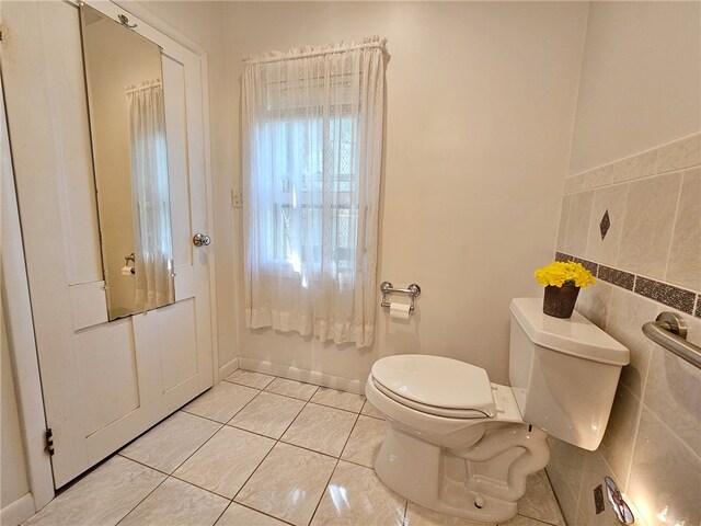 18 Wheeler St, Deposit, NY 13754 - half bathroom with baseboards, toilet, and tile patterned floors
