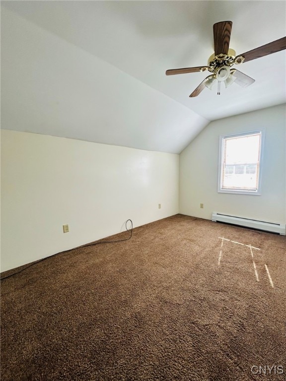 additional living space featuring ceiling fan, a baseboard heating unit, carpet flooring, and vaulted ceiling