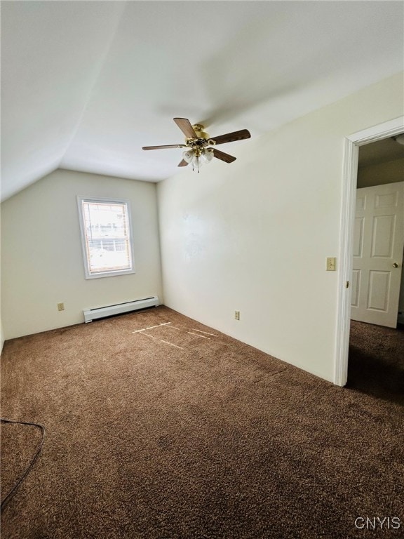 bonus room featuring ceiling fan, a baseboard heating unit, carpet, and lofted ceiling