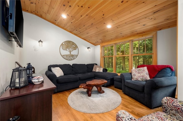 living room featuring lofted ceiling, light hardwood / wood-style floors, and wood ceiling