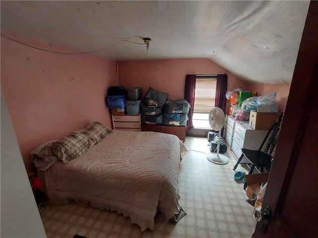 bedroom featuring vaulted ceiling