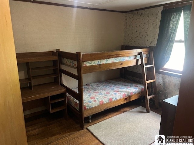 bedroom featuring wood-type flooring