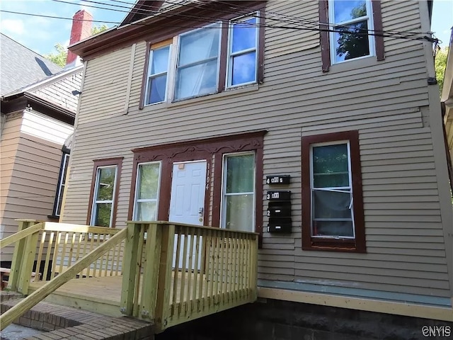 exterior space featuring a wooden deck