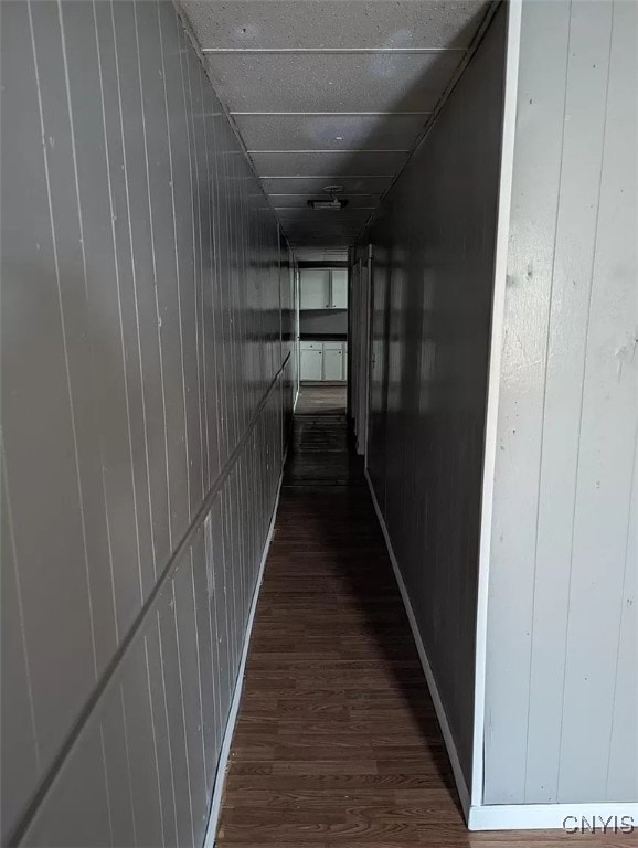 hallway with wood-type flooring