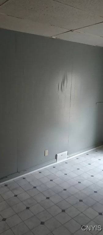 empty room with light tile patterned floors