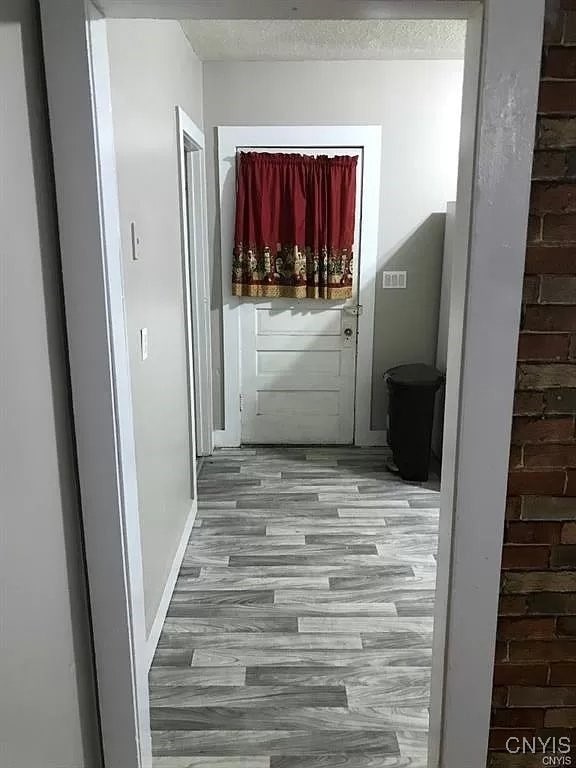 doorway featuring hardwood / wood-style flooring