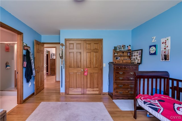 bedroom featuring light wood-type flooring