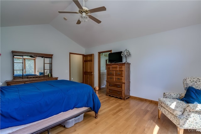 bedroom featuring ceiling fan, light wood-type flooring, and high vaulted ceiling