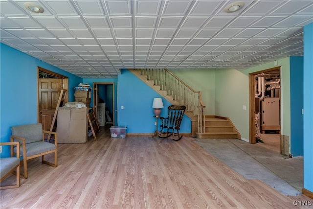 basement featuring light hardwood / wood-style floors