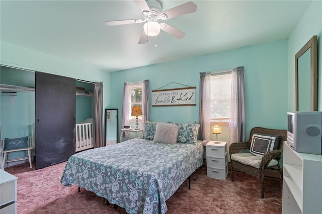 bedroom with carpet floors, ceiling fan, and a closet