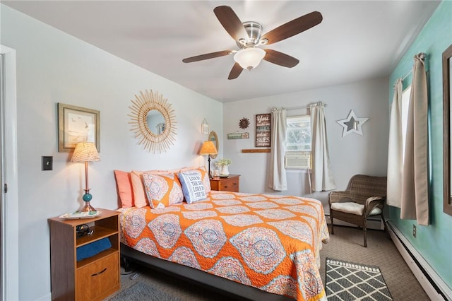 bedroom featuring ceiling fan, carpet, and baseboard heating