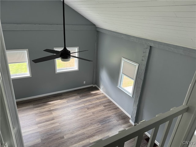 interior space with ceiling fan and wood-type flooring