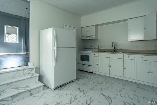 kitchen with sink, white appliances, white cabinets, and light wood-type flooring