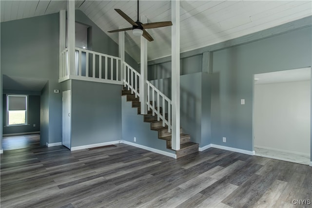 staircase with high vaulted ceiling, ceiling fan, hardwood / wood-style floors, and wooden ceiling