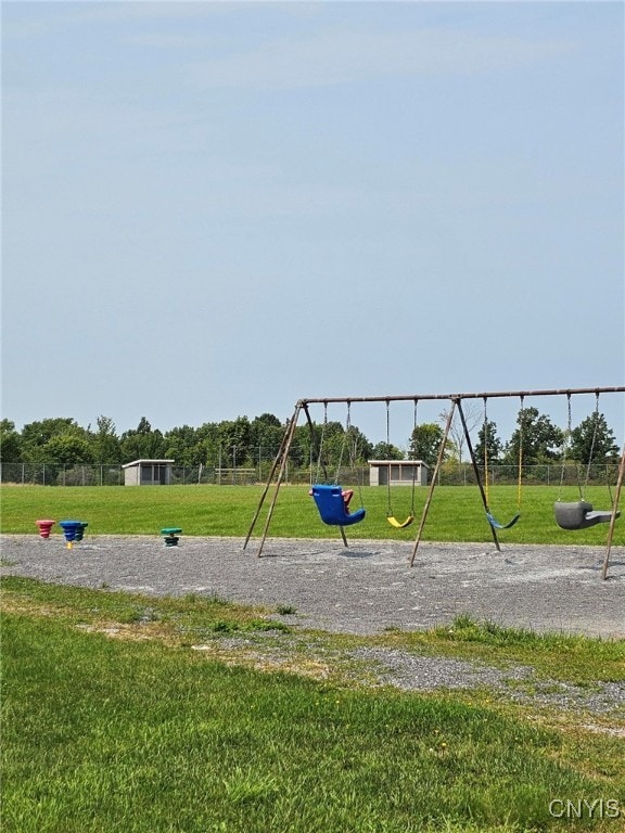 view of playground featuring a yard