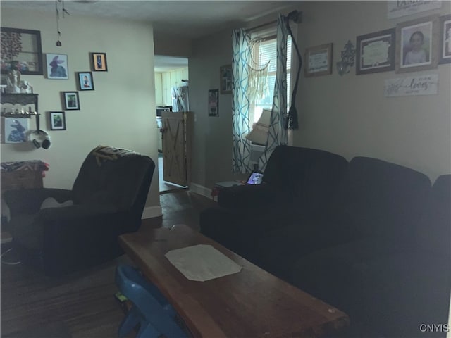 living room with dark wood-type flooring