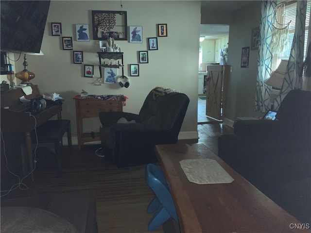 dining room with dark hardwood / wood-style floors