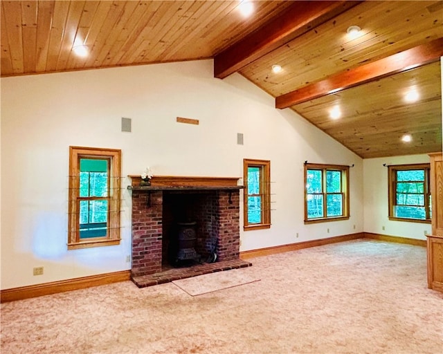 unfurnished living room with carpet floors, a fireplace, wooden ceiling, and lofted ceiling with beams