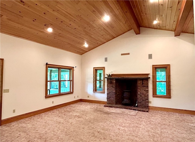 unfurnished living room featuring plenty of natural light, lofted ceiling with beams, and carpet