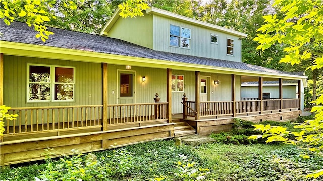 country-style home with covered porch