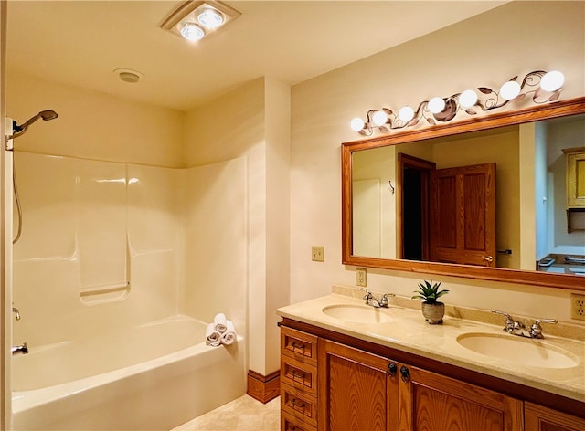 bathroom featuring vanity, bathing tub / shower combination, and tile patterned floors