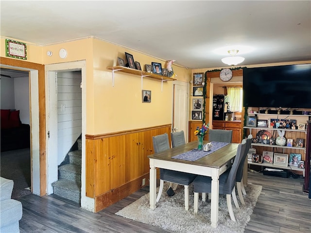 dining space featuring dark wood-type flooring