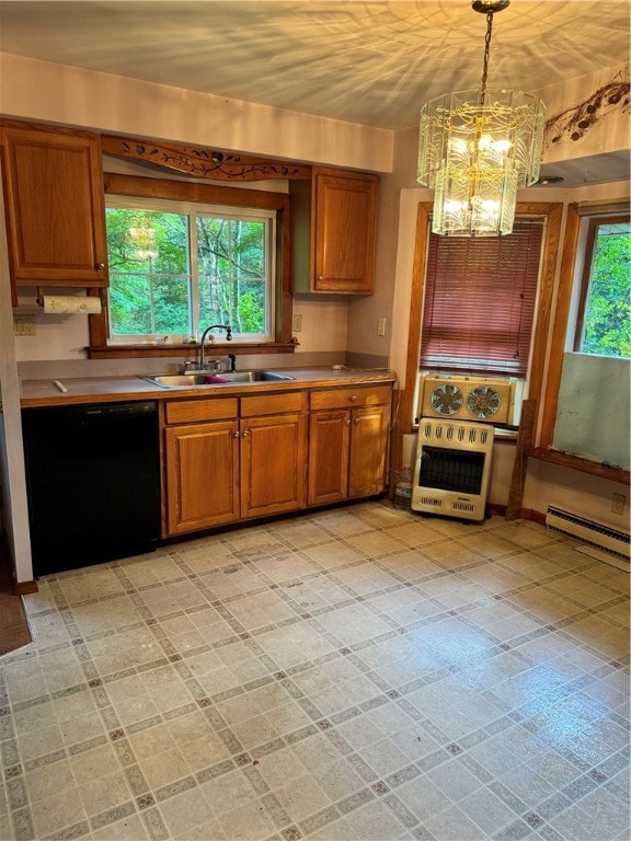 kitchen featuring black dishwasher, plenty of natural light, decorative light fixtures, and sink