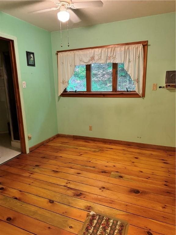 1356 Terry Clove Rd, Hamden, NY 13752 - unfurnished bedroom with hardwood / wood-style floors, ceiling fan, and baseboards