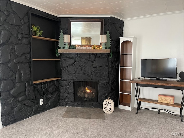 carpeted living room featuring a stone fireplace and ornamental molding