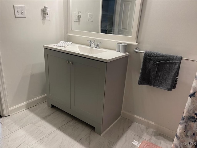 132 E Remington St, Rutland, NY 13612 - bathroom featuring baseboards, marble finish flooring, and vanity