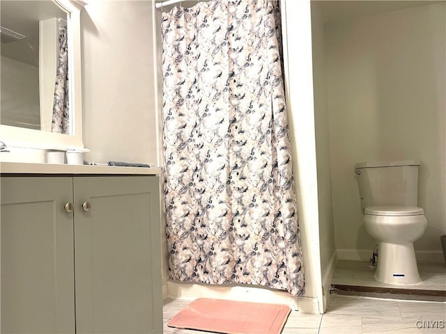 132 E Remington St, Rutland, NY 13612 - bathroom with toilet, vanity, curtained shower, and baseboards