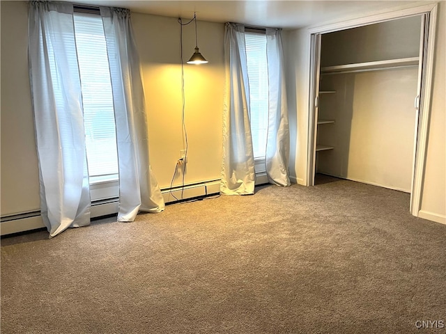 unfurnished bedroom featuring multiple windows, a closet, and carpet floors