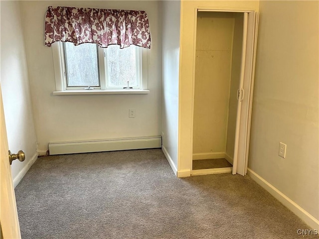 132 E Remington St, Rutland, NY 13612 - unfurnished bedroom with a baseboard radiator, carpet floors, and baseboards