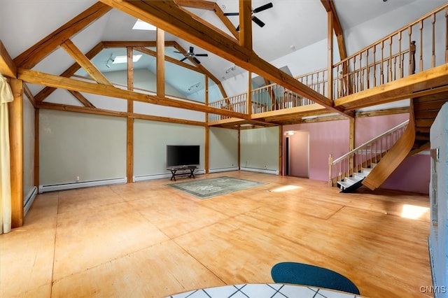 unfurnished living room featuring high vaulted ceiling, ceiling fan, and a baseboard radiator