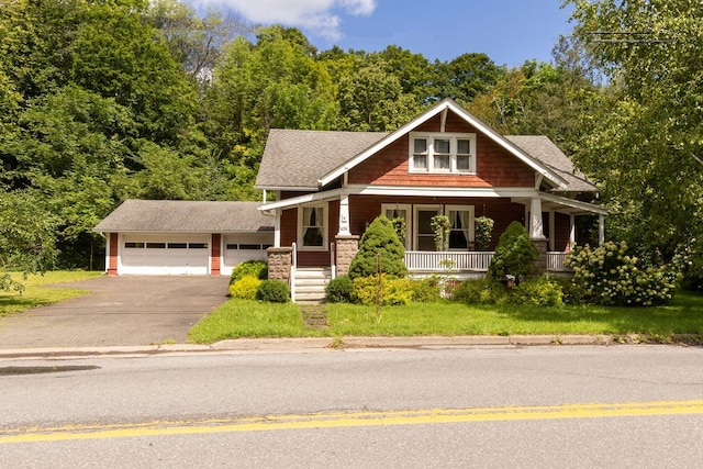 craftsman house featuring a garage and covered porch