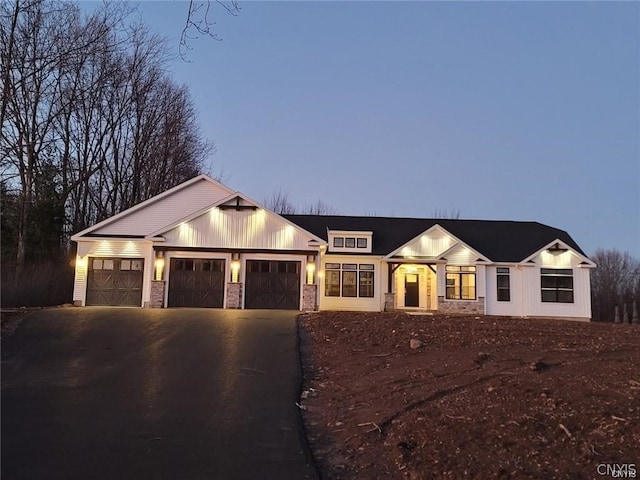 view of front of property featuring a garage