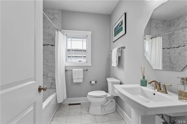 full bathroom with tile patterned flooring, toilet, sink, and shower / bathtub combination with curtain