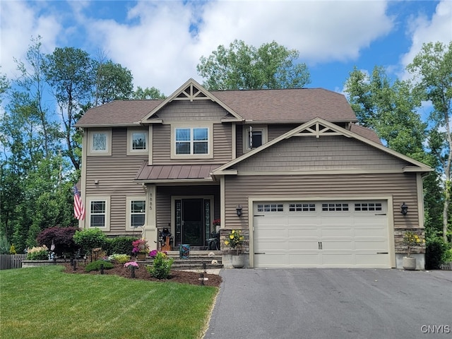 craftsman house with a front lawn