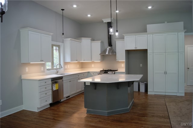 kitchen with sink, stainless steel dishwasher, dark hardwood / wood-style floors, and a kitchen island