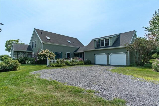 27454 County Route 57, Lyme, NY 13693 - view of front of property with gravel driveway, a front lawn, and roof with shingles