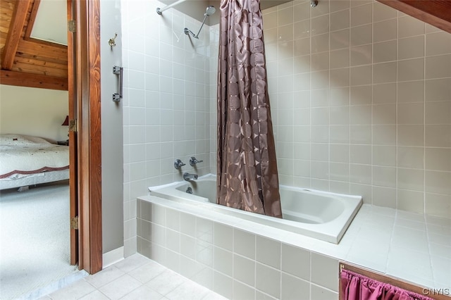 bathroom featuring tile patterned flooring and shower / tub combo