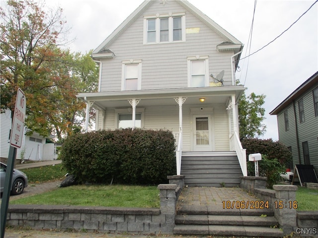 front facade with a porch