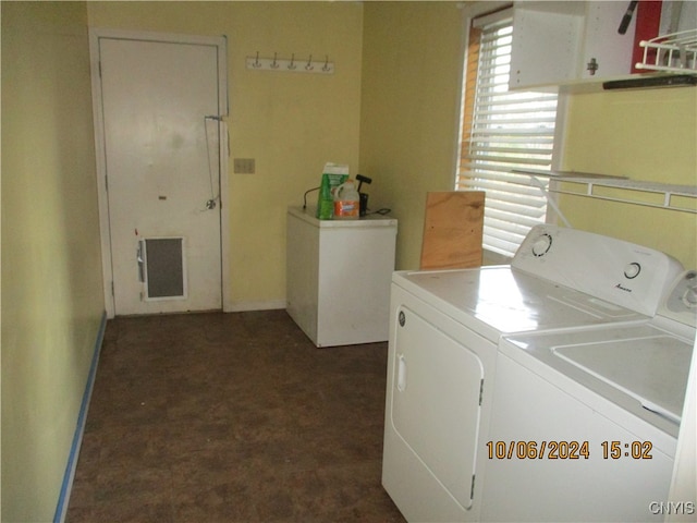 washroom featuring independent washer and dryer