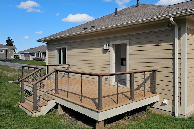 deck featuring a lawn