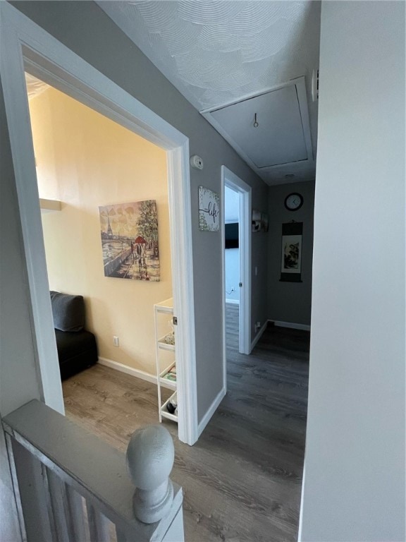 corridor featuring hardwood / wood-style flooring