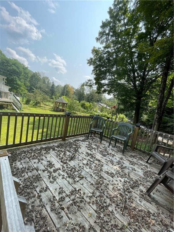 deck featuring a lawn