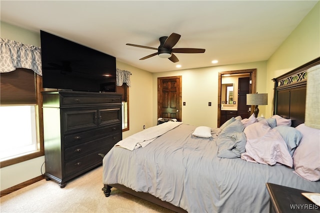 carpeted bedroom with ceiling fan