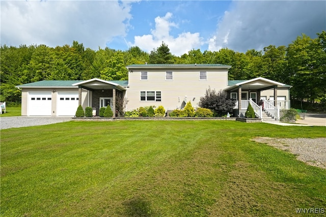 view of front of home with a garage, a porch, and a front yard