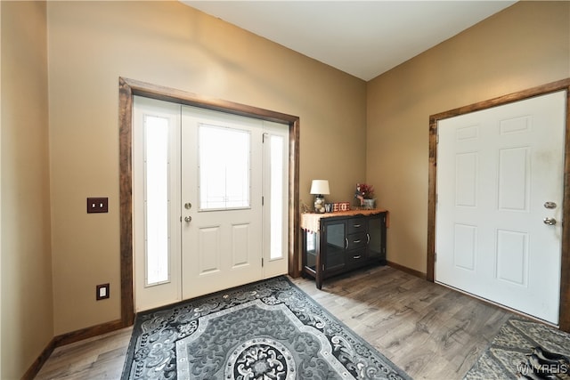 foyer with light hardwood / wood-style floors