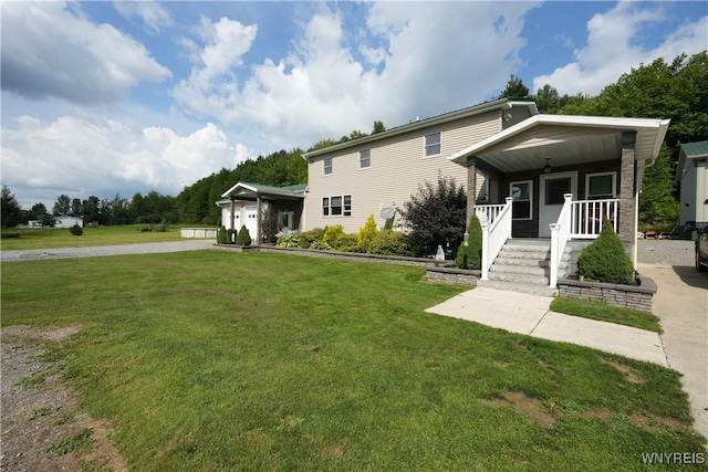 view of front of property featuring a front lawn and covered porch